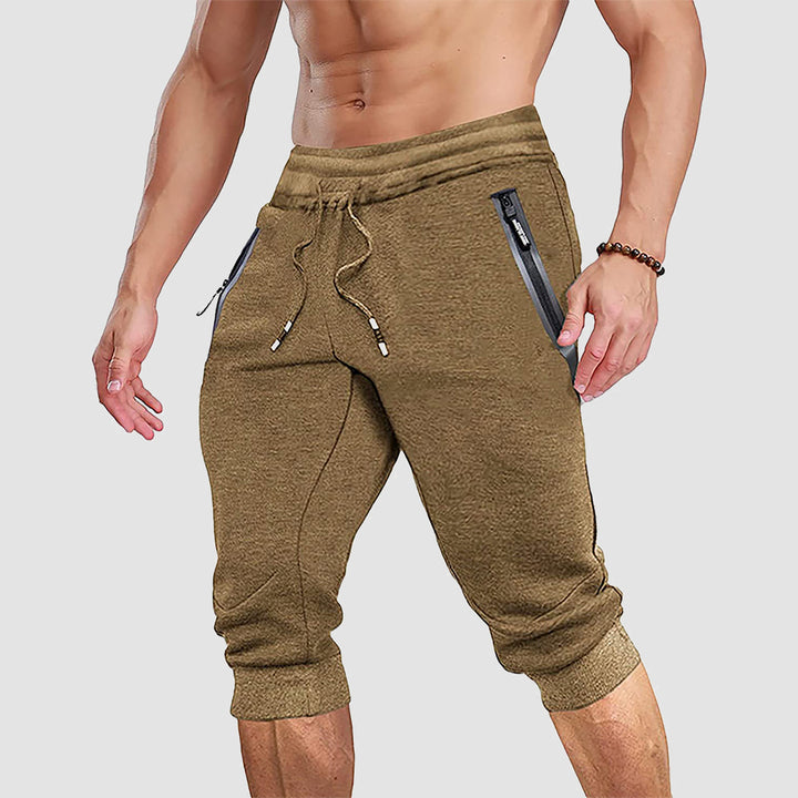 Men Capris Joggers with Zipper Pocket Drawstring Slim Fit Tapered Training Shorts