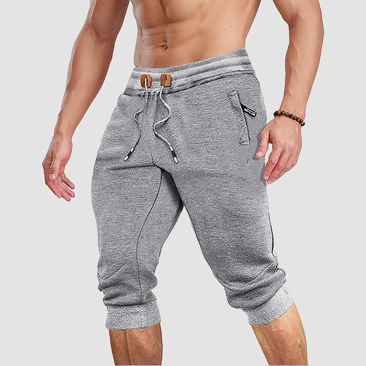 Men Capris Joggers with Zipper Pocket Drawstring Slim Fit Tapered Training Shorts