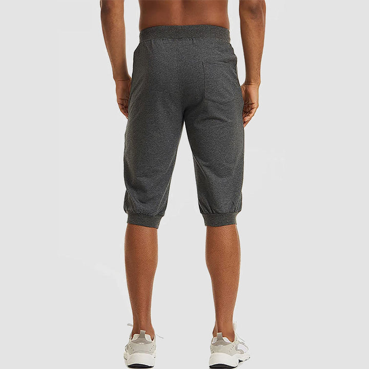 Men's 3/4 Jogger Capri Pants with Zipper Pockets Knee Length Running Training Workout Shorts - MAGCOMSEN